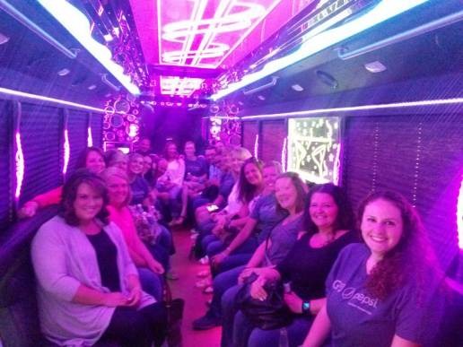 Luxury limousine service by transportwayhub.pro featuring satisfied customers celebrating memorable moments.