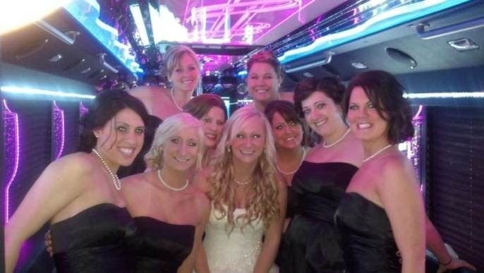 Happy customers enjoying luxury limousine service from transportwayhub.pro in a memorable experience.