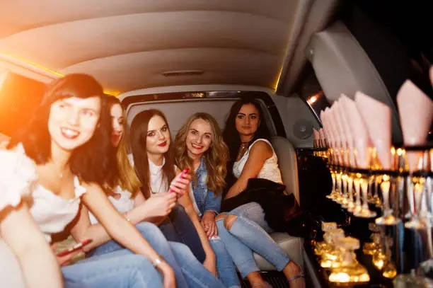 Luxury limousine service by transportwayhub.pro showcasing satisfied customers enjoying memorable experiences.