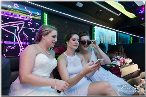 Happy customers enjoying luxury limousine service from transportwayhub.pro during a memorable event.